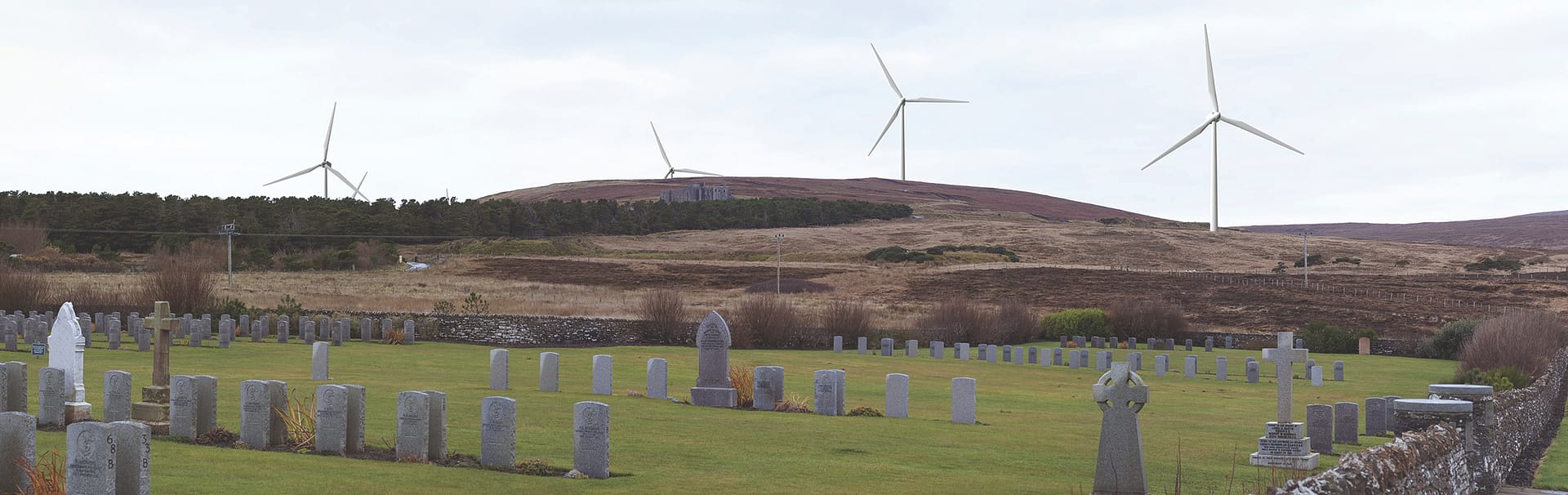View from Lyness Naval Cemetery to the Hoy Wind Farm.