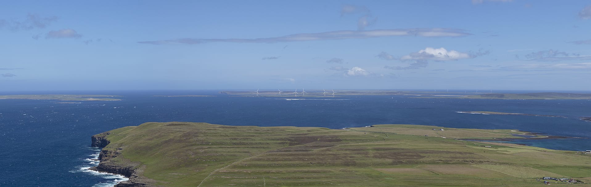 View from the east coast of Rousay to Faray Wind Farm.